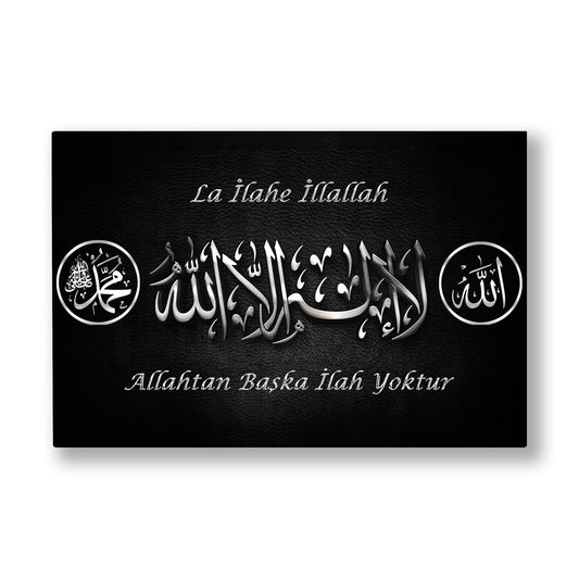 Gümüş Kelime-i Tevhid Levhası kanvas tablo — Siyah zeminde gümüş parlaklığıyla işlenmiş kelime-i tevhid istifi ve altında Türkçe karşılığı.