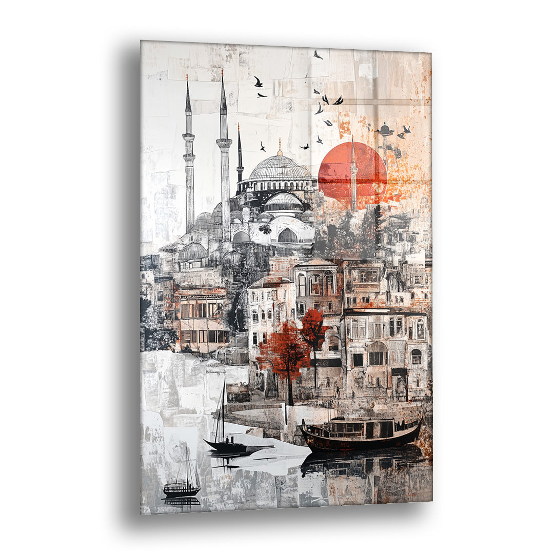 Gri Kırmızı Güneşli Cami cam tablo — kubbeli ve çift minareli bir camiyi, kırmızı bir güneşin ve gri-beyaz kolaj dokunuşların