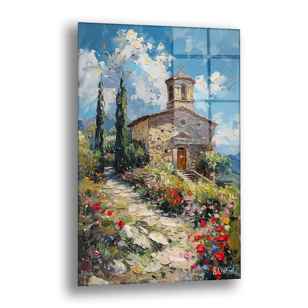 Taş Kilise ve Çiçekler cam tablo — çiçekli patikanın sonunda duran küçük taş kiliseyi güneşli bir sabaha taşıyor.