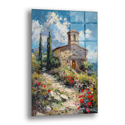 Taş Kilise ve Çiçekler cam tablo — çiçekli patikanın sonunda duran küçük taş kiliseyi güneşli bir sabaha taşıyor.